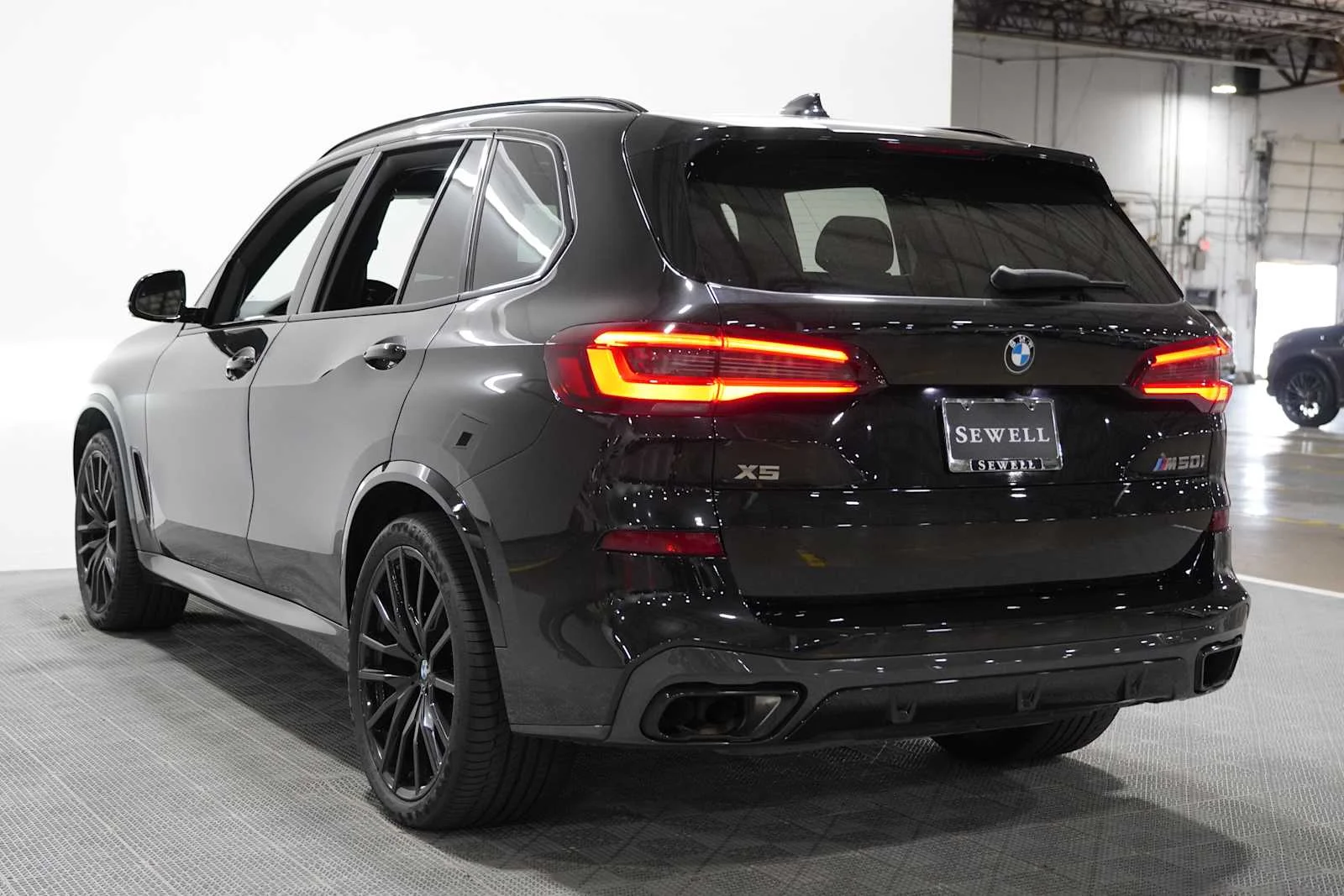 Certified Used 2023 Black Sapphire Metallic BMW M50i image 6