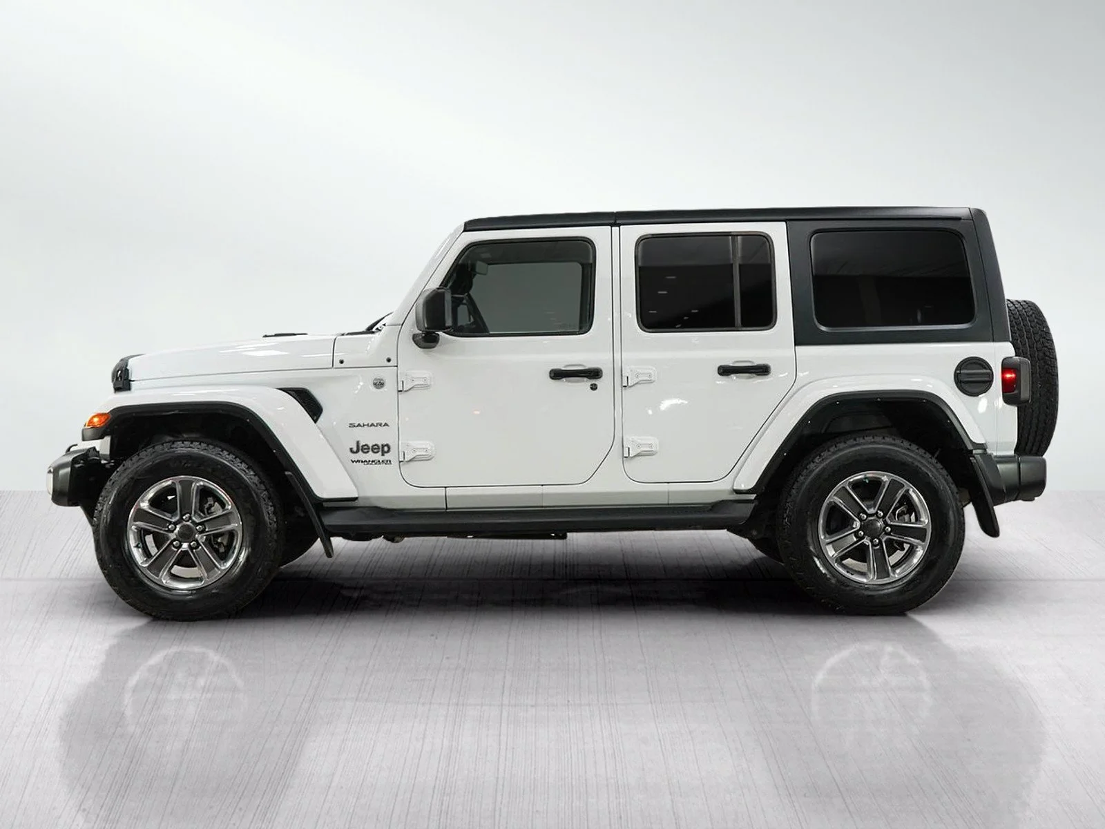 Used 2021 Jeep Wrangler Unlimited Sahara with VIN 1C4HJXEG0MW862524 for sale in Wayzata, Minnesota