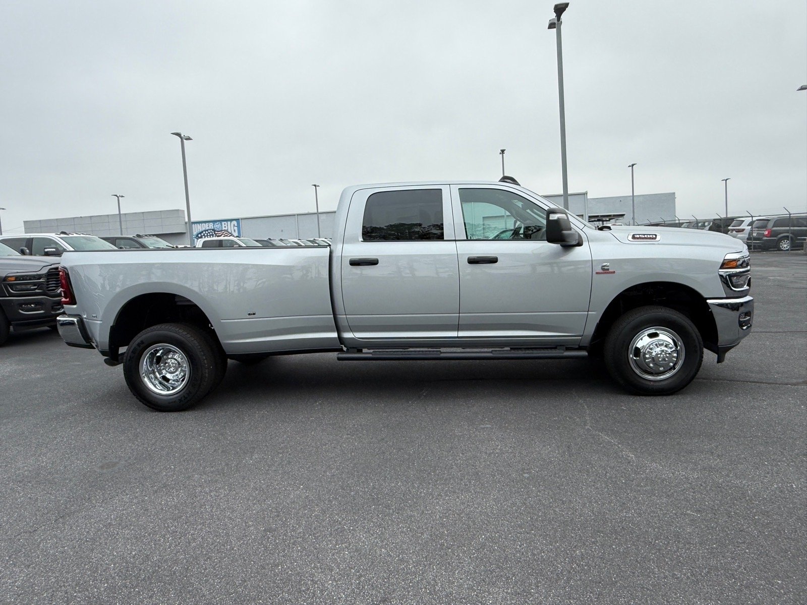 New 2026 Silver-Zynith Exterior Paint RAM Tradesman Crew Cab 4x4 8
