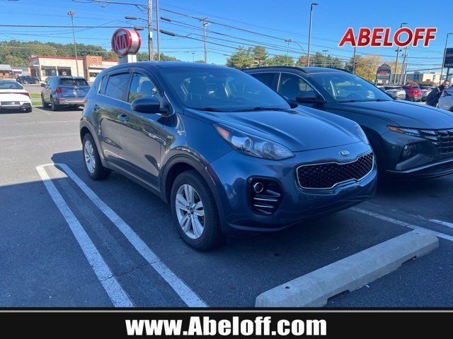 Used 2019 Pacific Blue Kia LX image 1