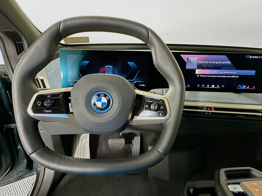 Certified Used 2024 Blue BMW xDrive50 image 11