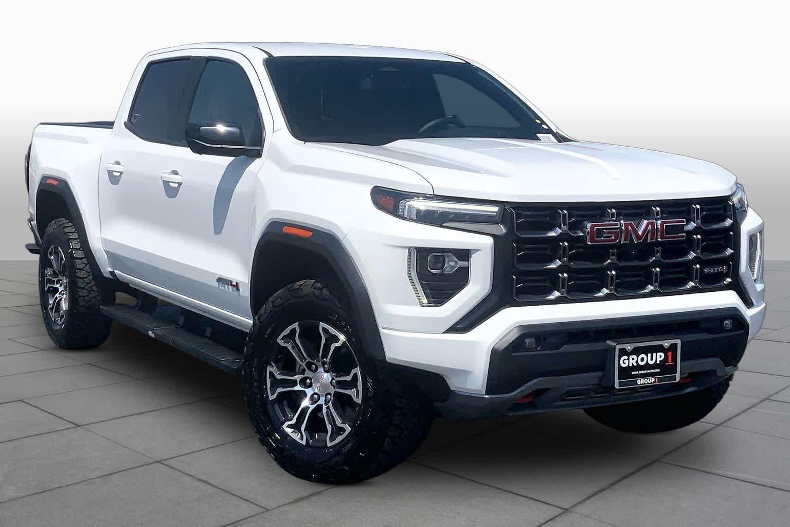 Used 2024 Summit White GMC 4WD AT4 image 6