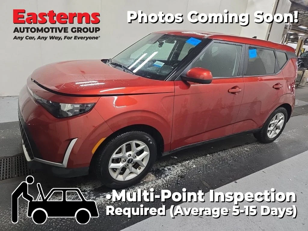 Used 2023 Orange Kia LX image 1