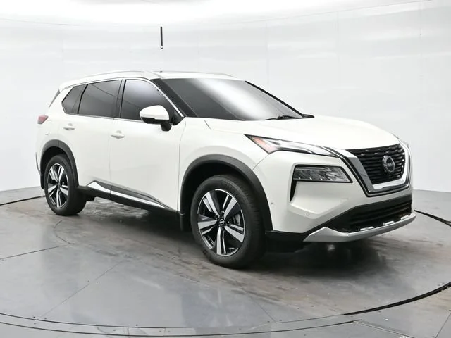 Used 2023 Pearl White Trico Nissan Platinum image 1