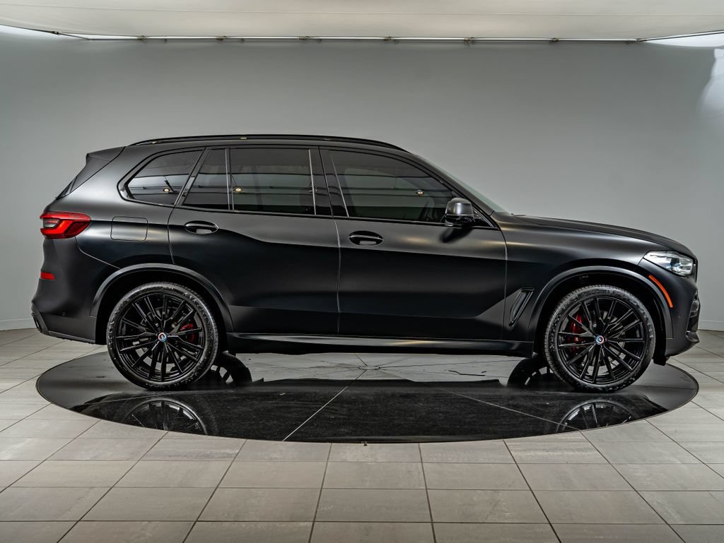 Used 2023 Frozen Black Metallic BMW M50i image 4