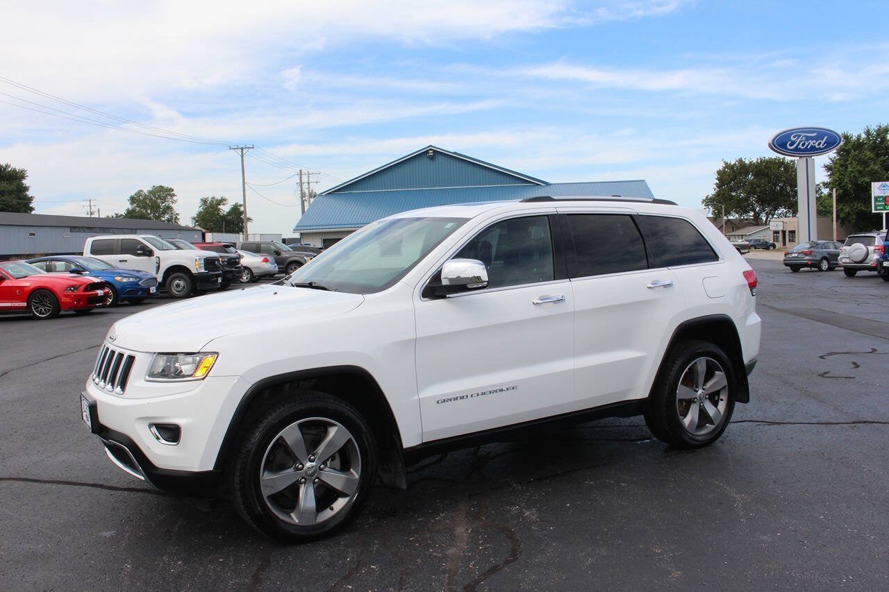 Used 2015 Bright White Clear Coat Jeep Limited 4x4 4dr SUV image 1
