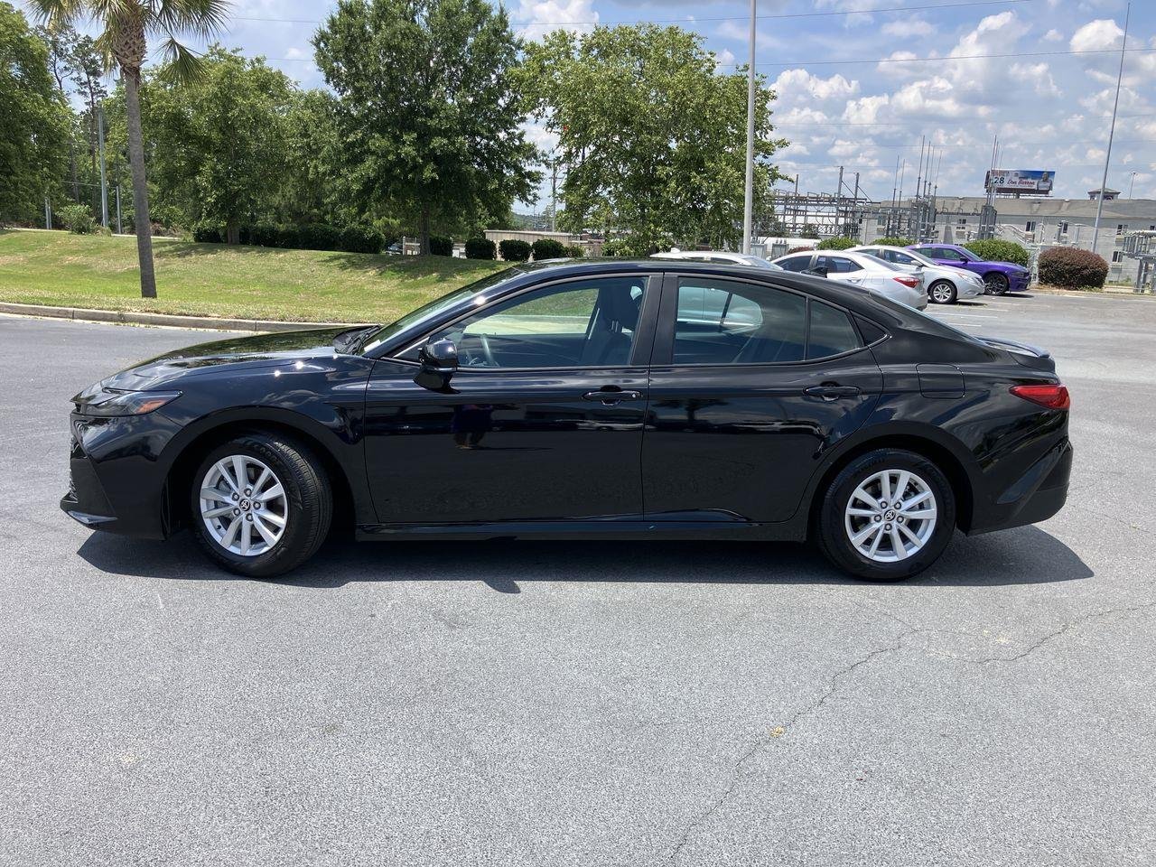 Used 2026 Black (Midnight Black Metallic) Toyota LE image 2