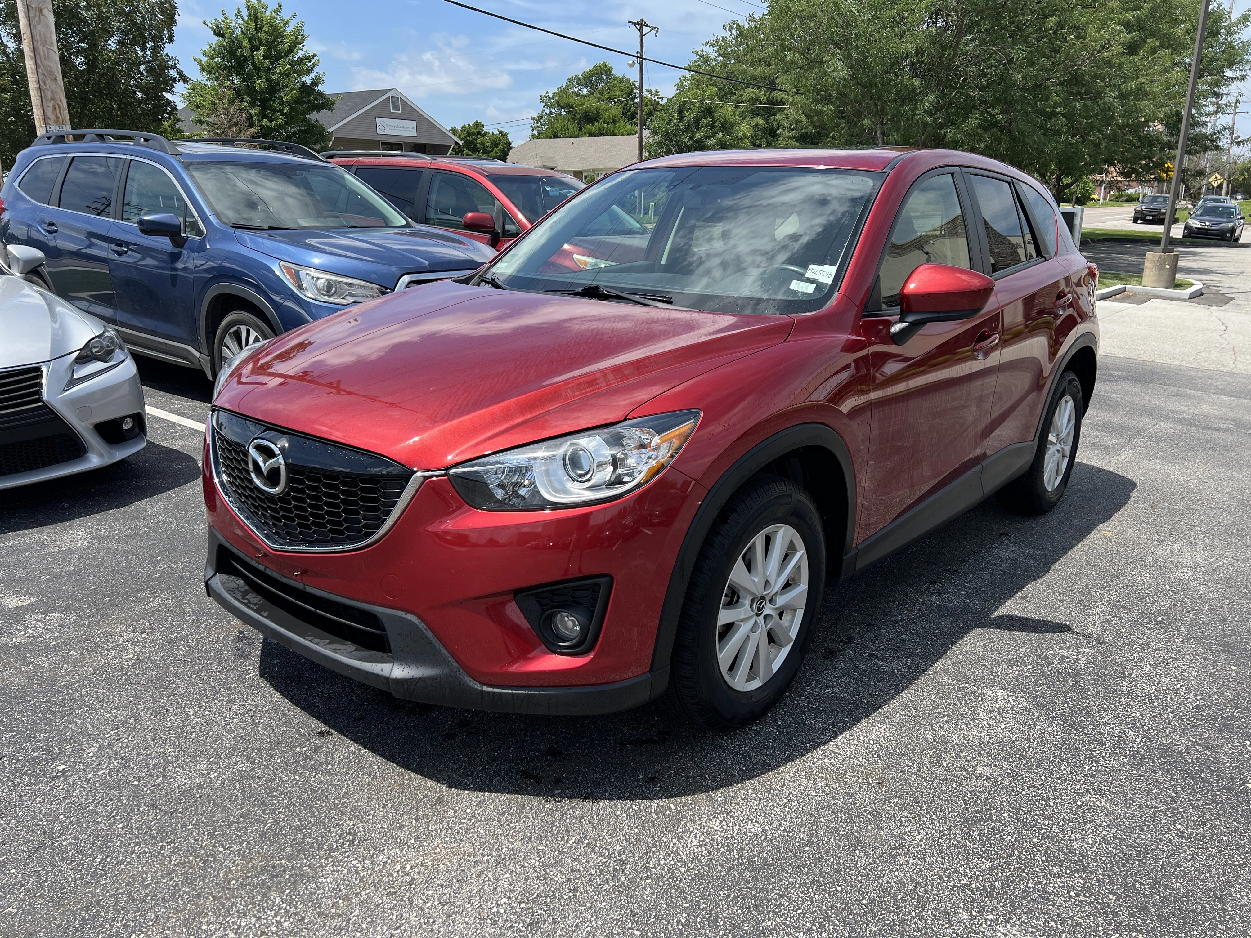 Used 2013 Zeal Red Mica Mazda Touring image 4