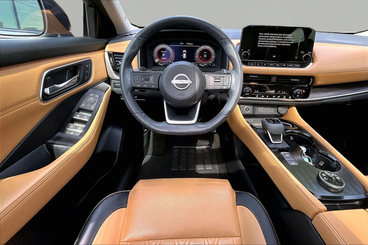 Used 2023 Pearl White Tricoat/Super Black Nissan Platinum image 6