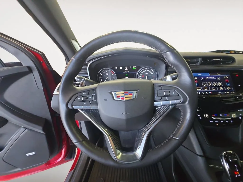 Used 2024 Radiant Red Tintcoat Cadillac Sport image 13