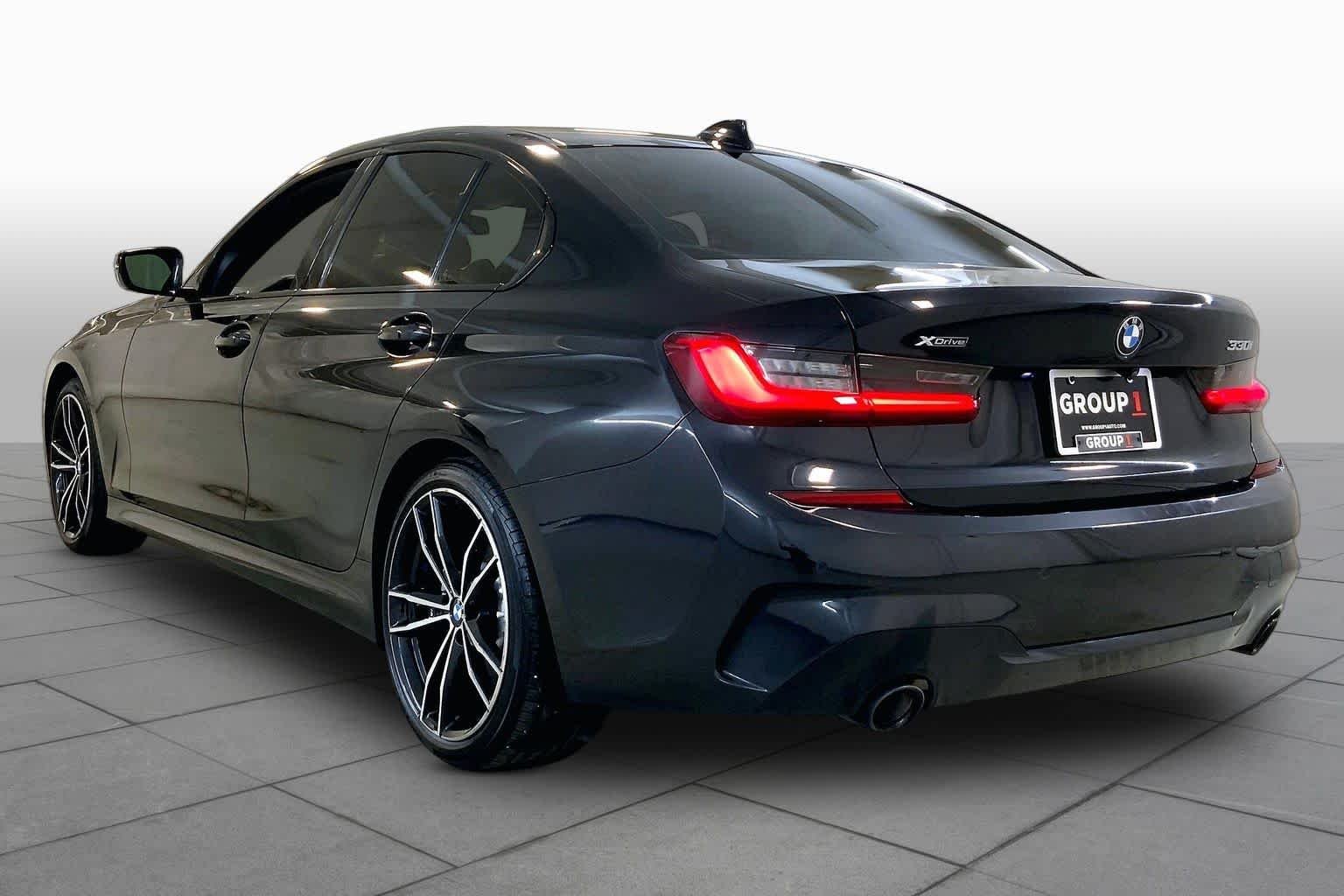 Used 2021 Black Sapphire Metallic BMW 330i xDrive image 11