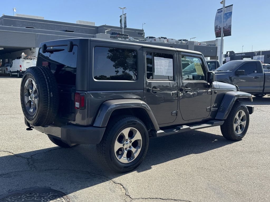 Certified Used 2018 Granite Crystal Clearcoat Metallic Jeep Unlimited Sahara image 6