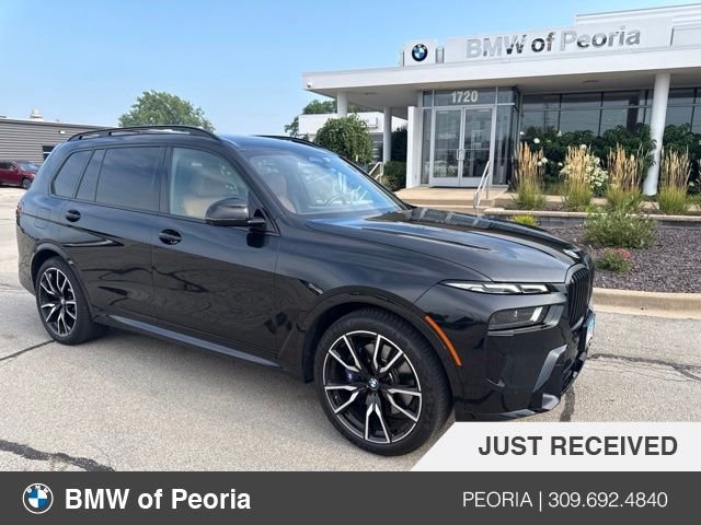 Used 2023 Black Sapphire Metallic BMW xDrive40i image 1