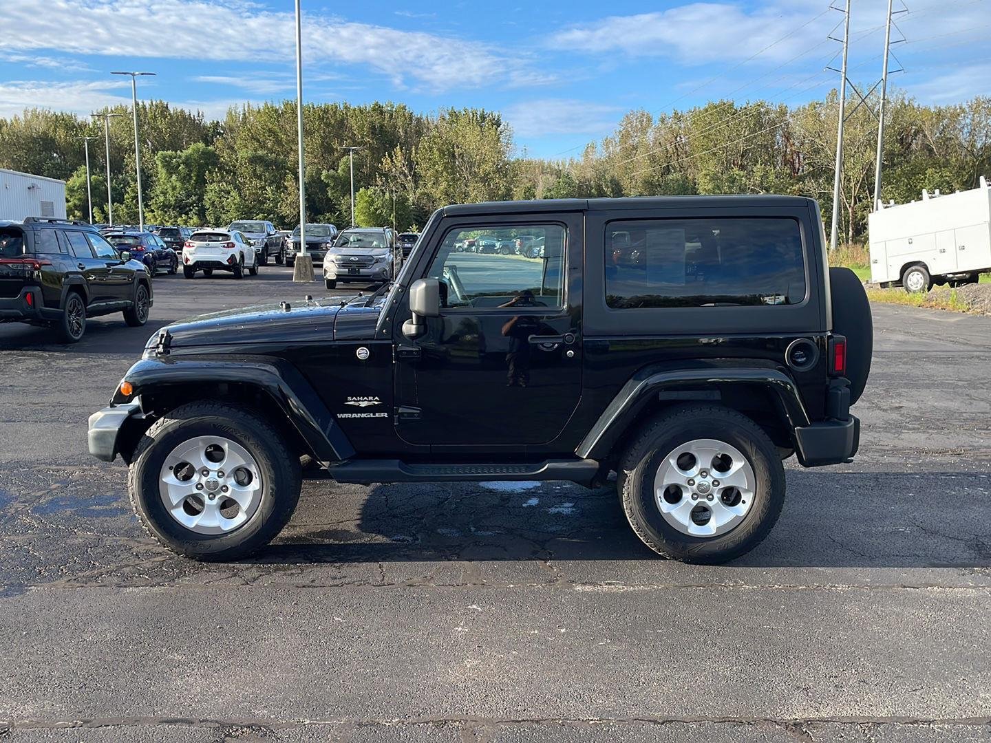 Used 2015 Jeep Wrangler Sahara with VIN 1C4AJWBGXFL756733 for sale in East Peoria, IL
