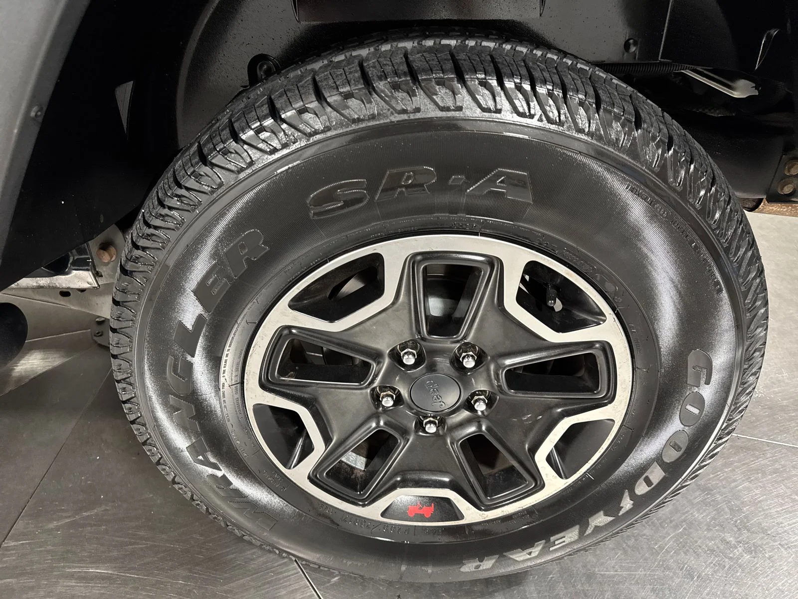 Used 2012 Black / Forest Green Jeep Sport image 12
