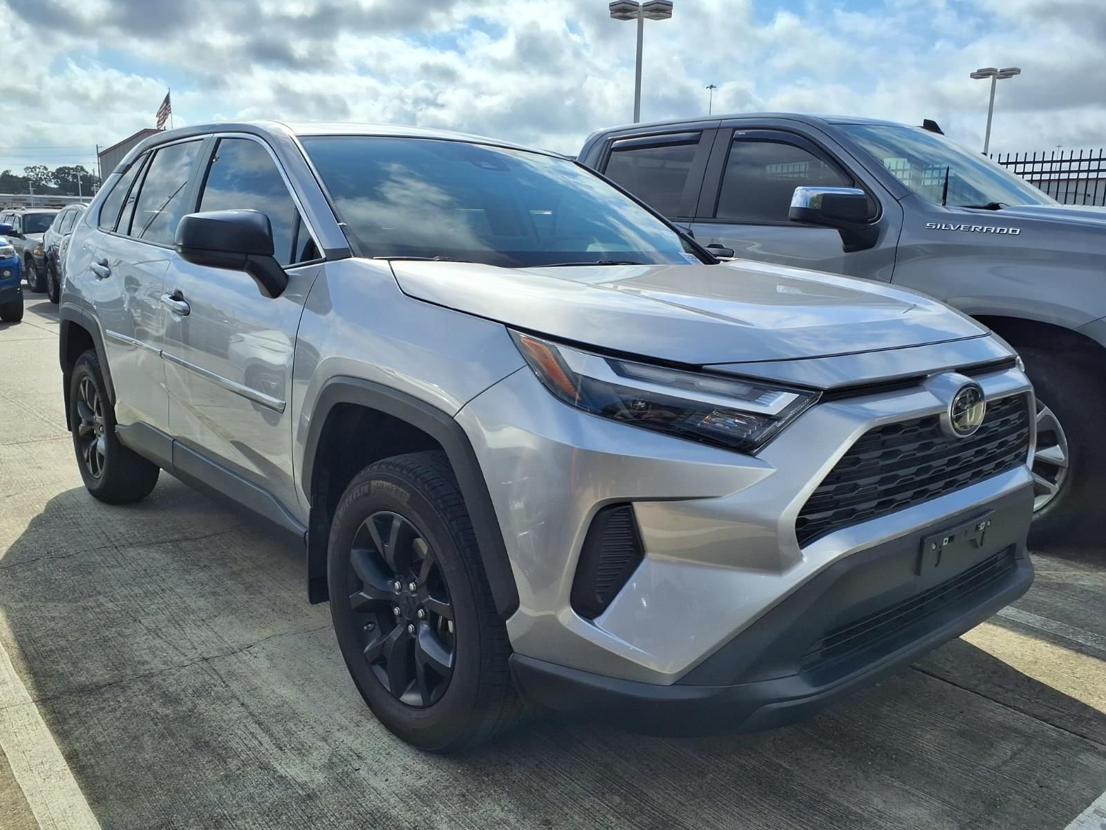 Used 2023 Silver Sky Metallic Toyota LE image 1