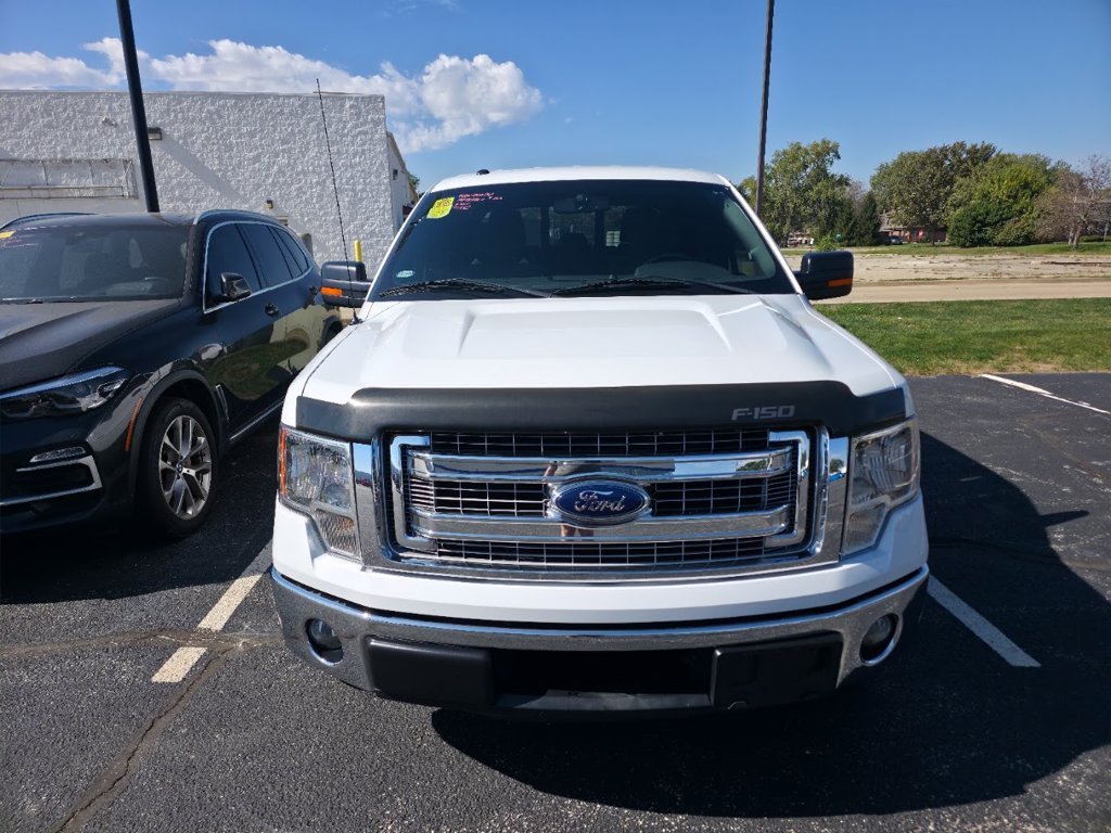 Used 2013 Oxford White Ford XLT image 1