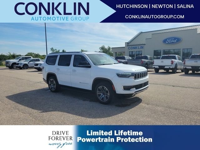 Used 2024 Bright White Clearcoat Jeep Series II image 1