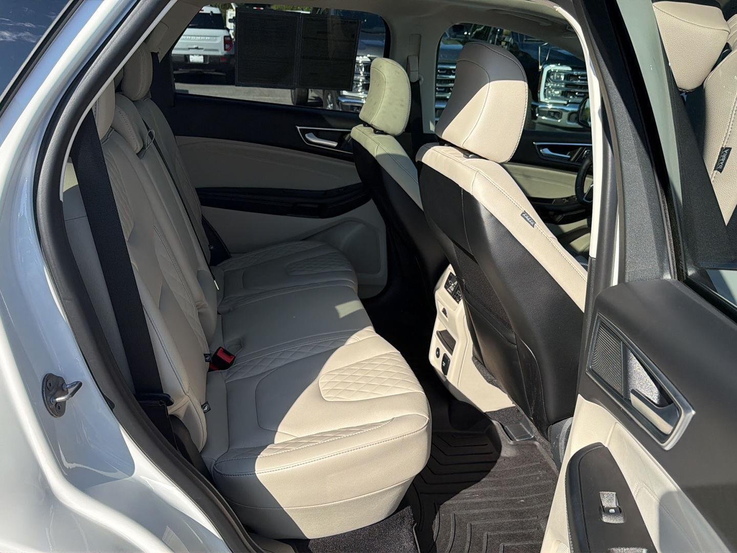 Used 2024 Star White Metallic Tri-Coat Ford Titanium image 13
