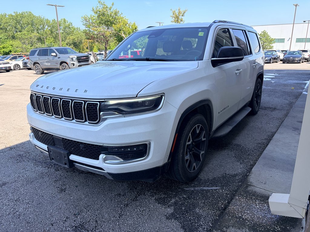 Used 2023 Bright White Jeep Series III image 1
