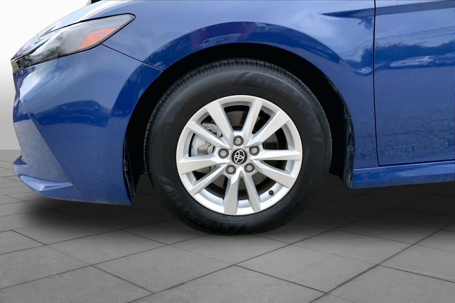 Used 2025 Reservoir Blue Toyota LE image 11
