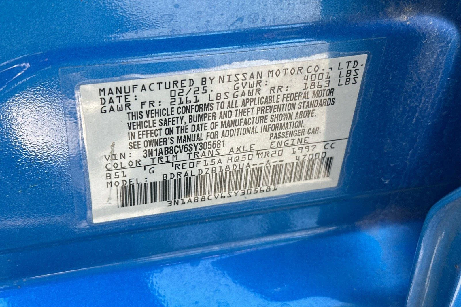 Used 2025 Electric Blue Metallic Nissan SV image 28