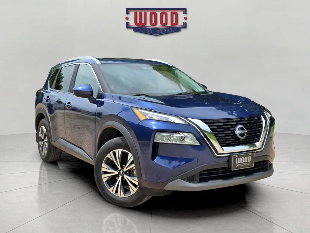 Used 2023 Caspian Blue Metallic Nissan SV image 1