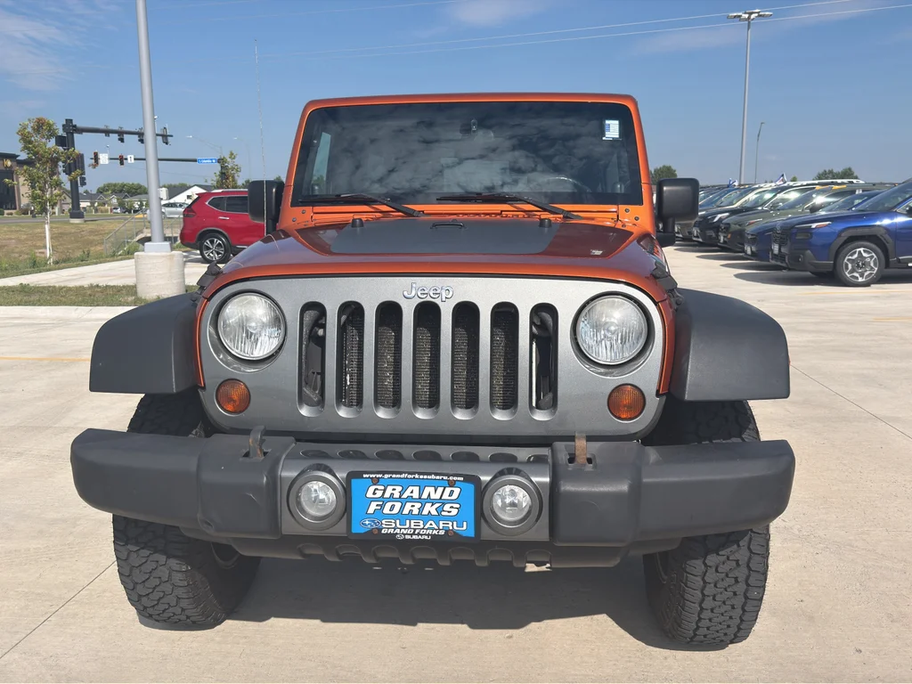 Used 2010 ORANGE Jeep Mountain image 3