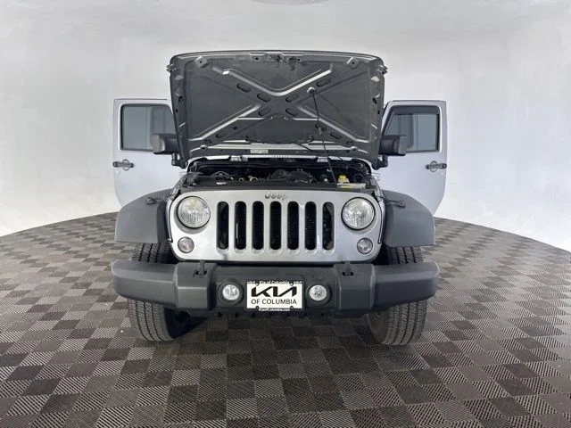 Used 2014 Silver Jeep Unlimited Sport image 13