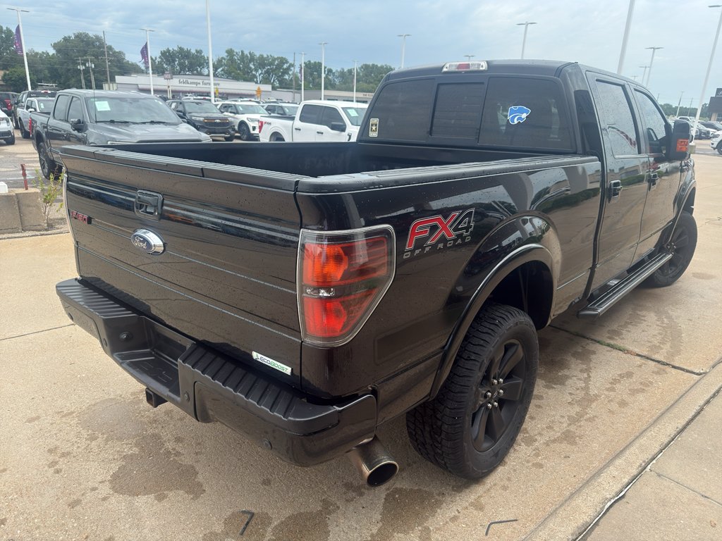 Used 2013 Tuxedo Black Metallic Ford FX4 image 6