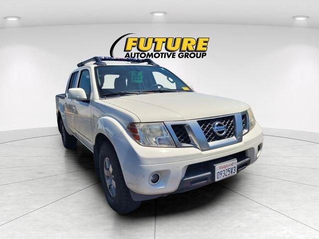 Used 2013 White Nissan PRO-4X image 1