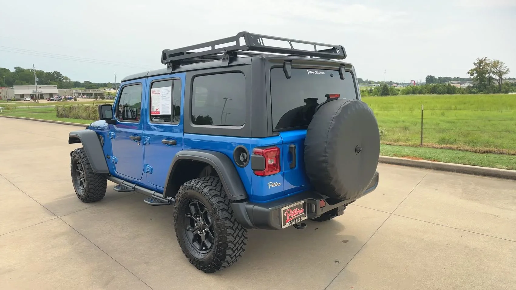 Used 2024 Hydro Blue Pearl Coat Jeep Sport image 7