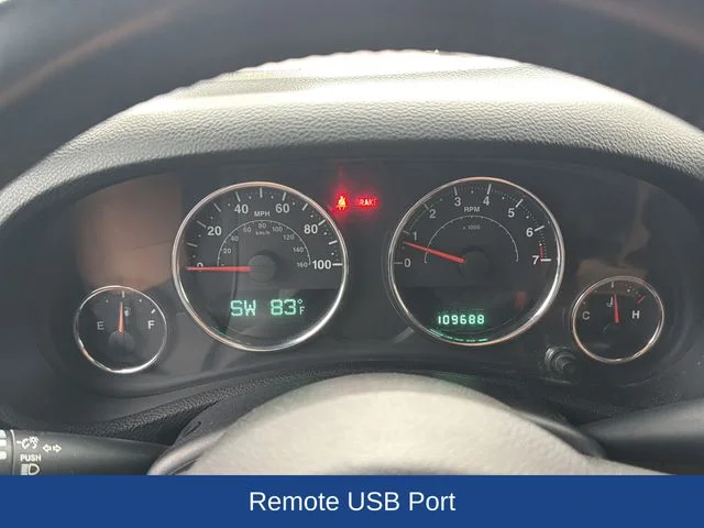 Used 2013 Red Jeep Unlimited Sahara image 11