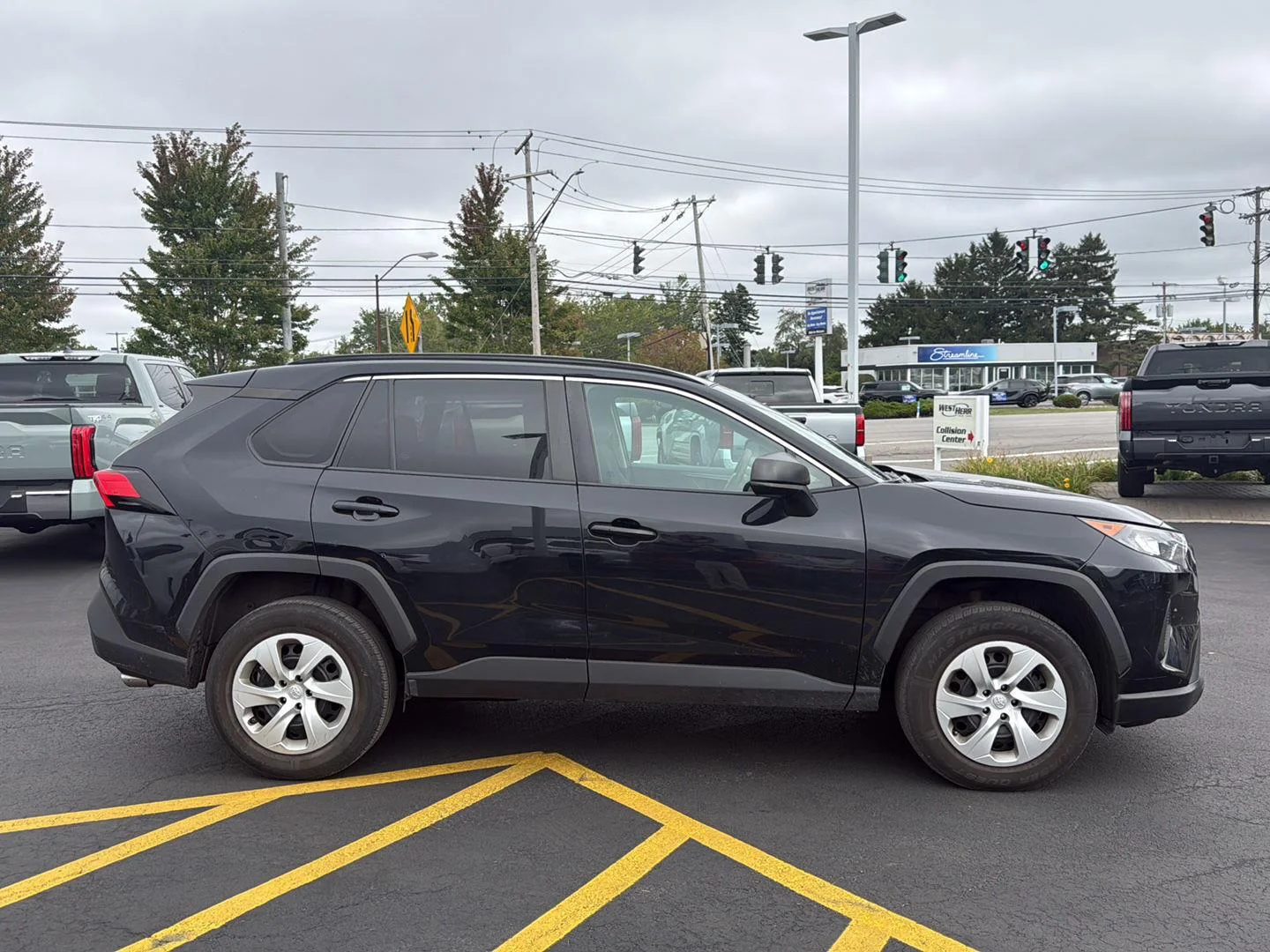 Used 2020 Midnight Black Metallic Toyota LE image 2