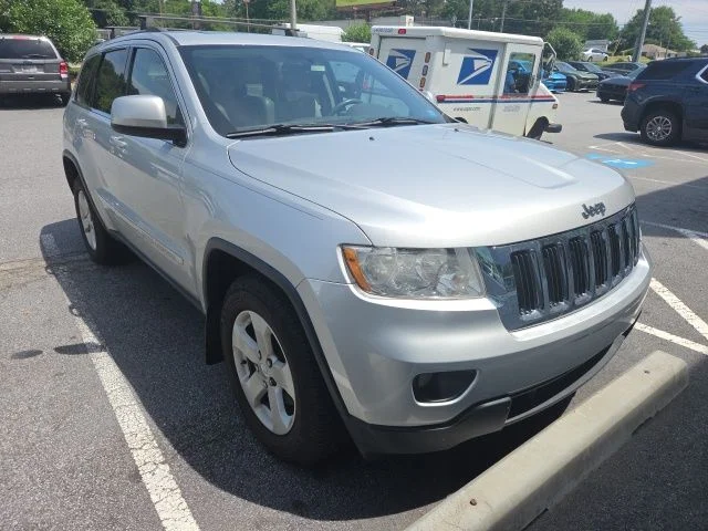 Used 2012 Jeep Grand Cherokee Laredo with VIN 1C4RJFAG1CC302676 for sale in Stone Mountain, GA