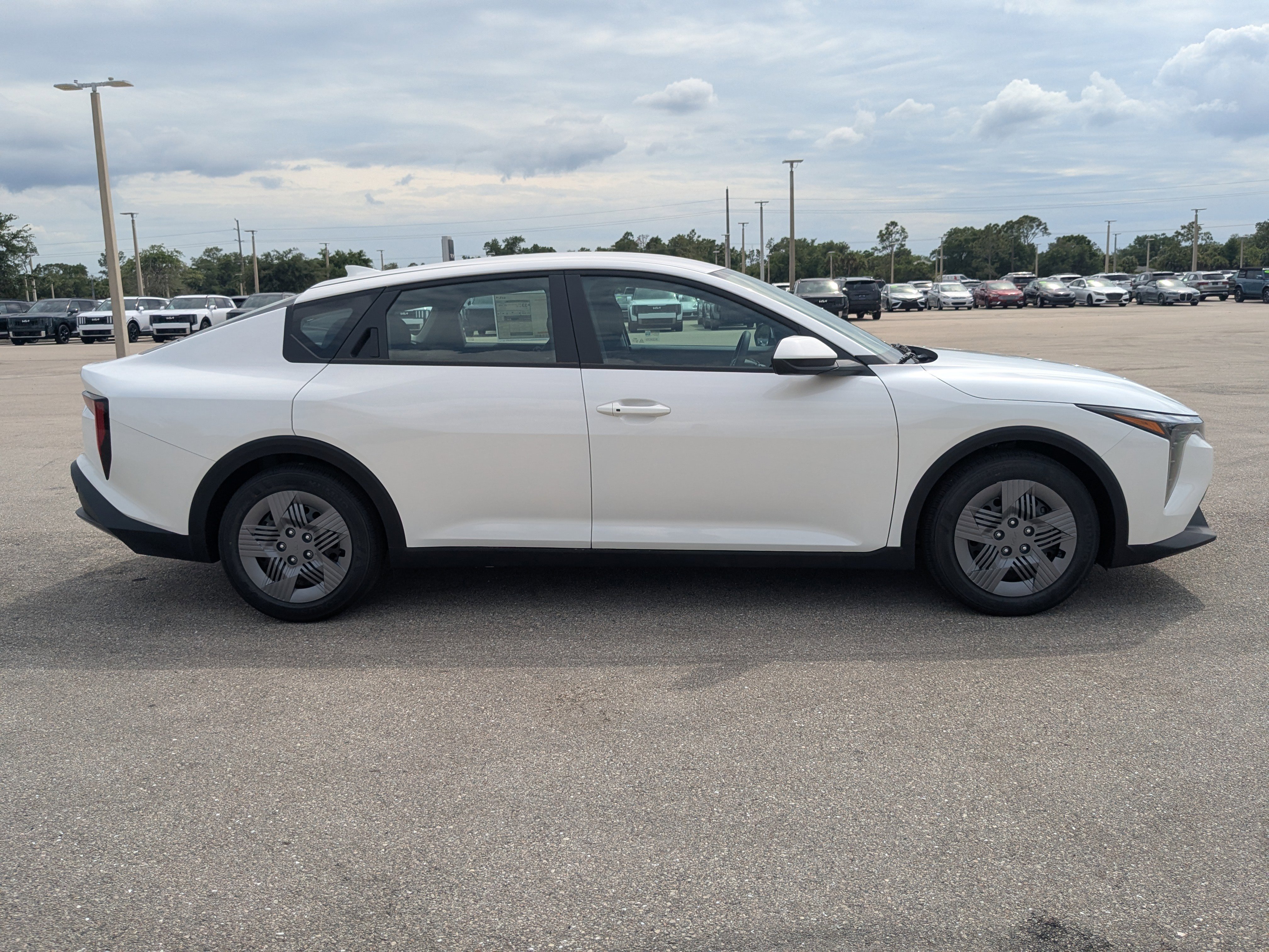 New 2026 Snow White Pearl Kia LX image 4