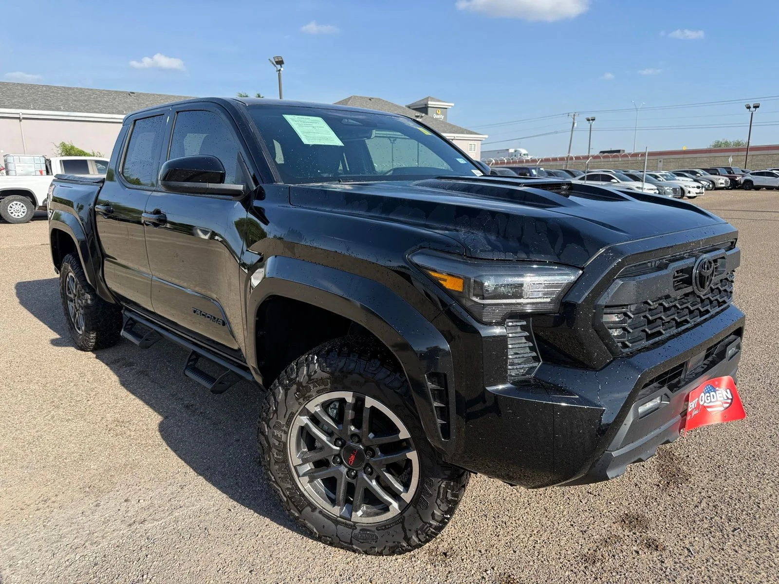 Used 2025 Black Toyota TRD Sport image 1