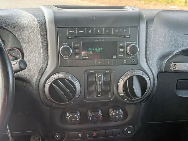 Used 2011 Green Jeep Unlimited Sport image 19