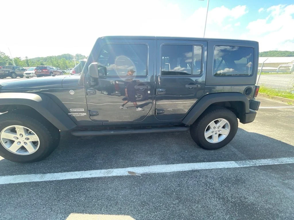 Used 2018 Black Jeep Unlimited Sport image 4