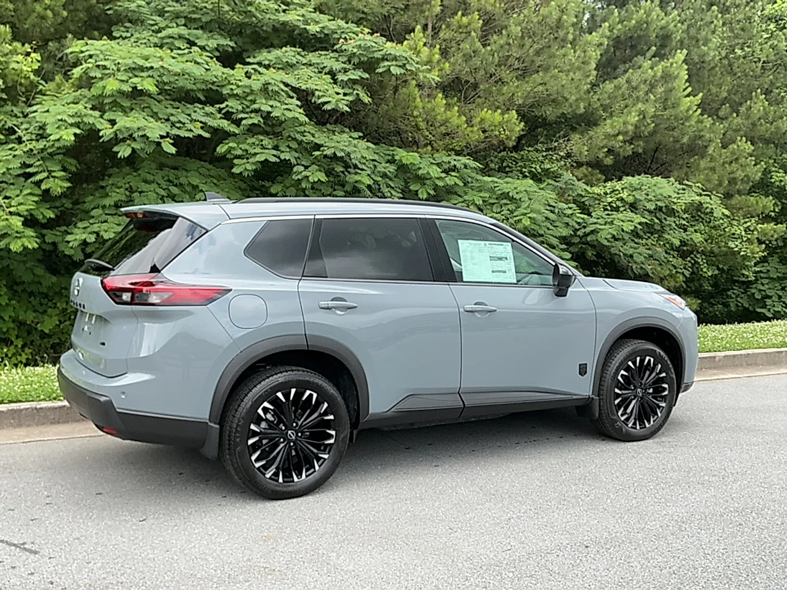 New 2026 Boulder Gray Pearl Nissan Dark Armor image 2