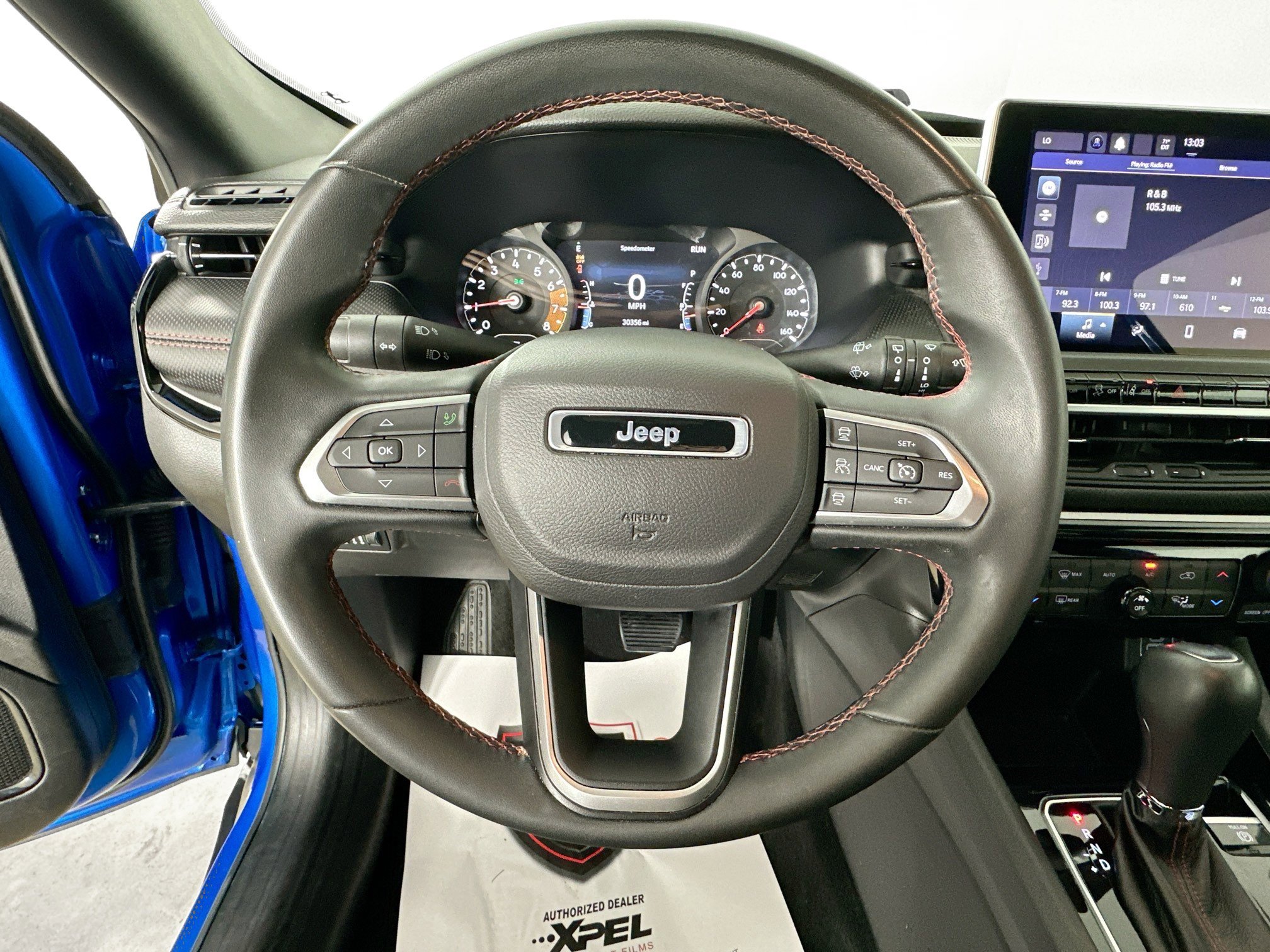 Used 2024 Hydro Blue Pearlcoat Jeep Trailhawk image 11