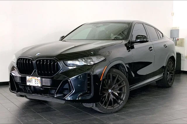 Certified Used 2024 Black Sapphire Metallic BMW xDrive40i image 1