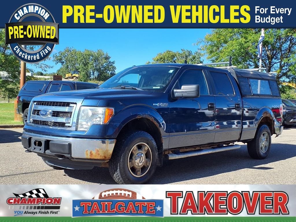 Used 2013 Blue Ford XLT image 1