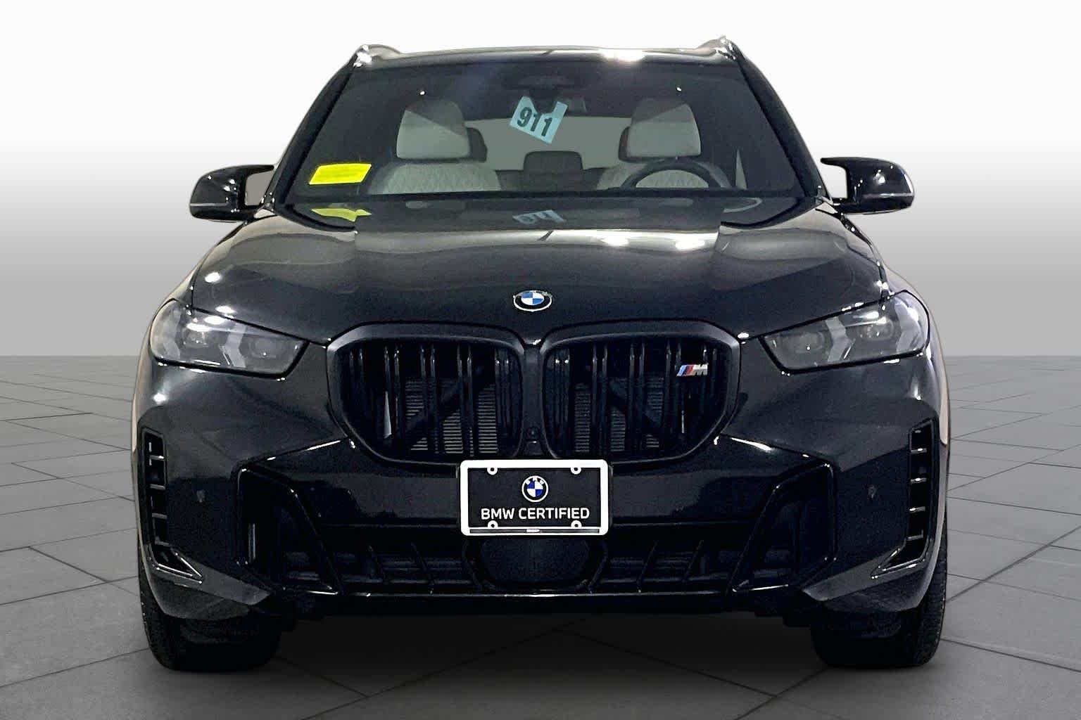 Certified Used 2024 Black Sapphire Metallic BMW M60i image 3