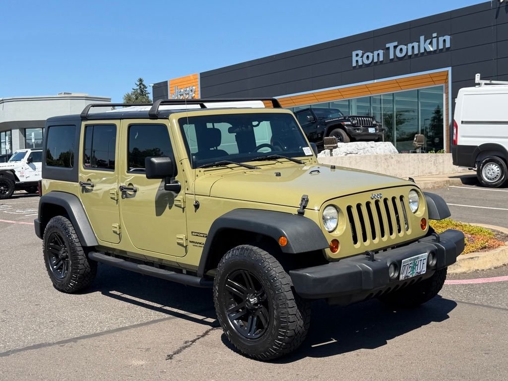Used 2013 Commando Green Jeep Unlimited Sport image 1