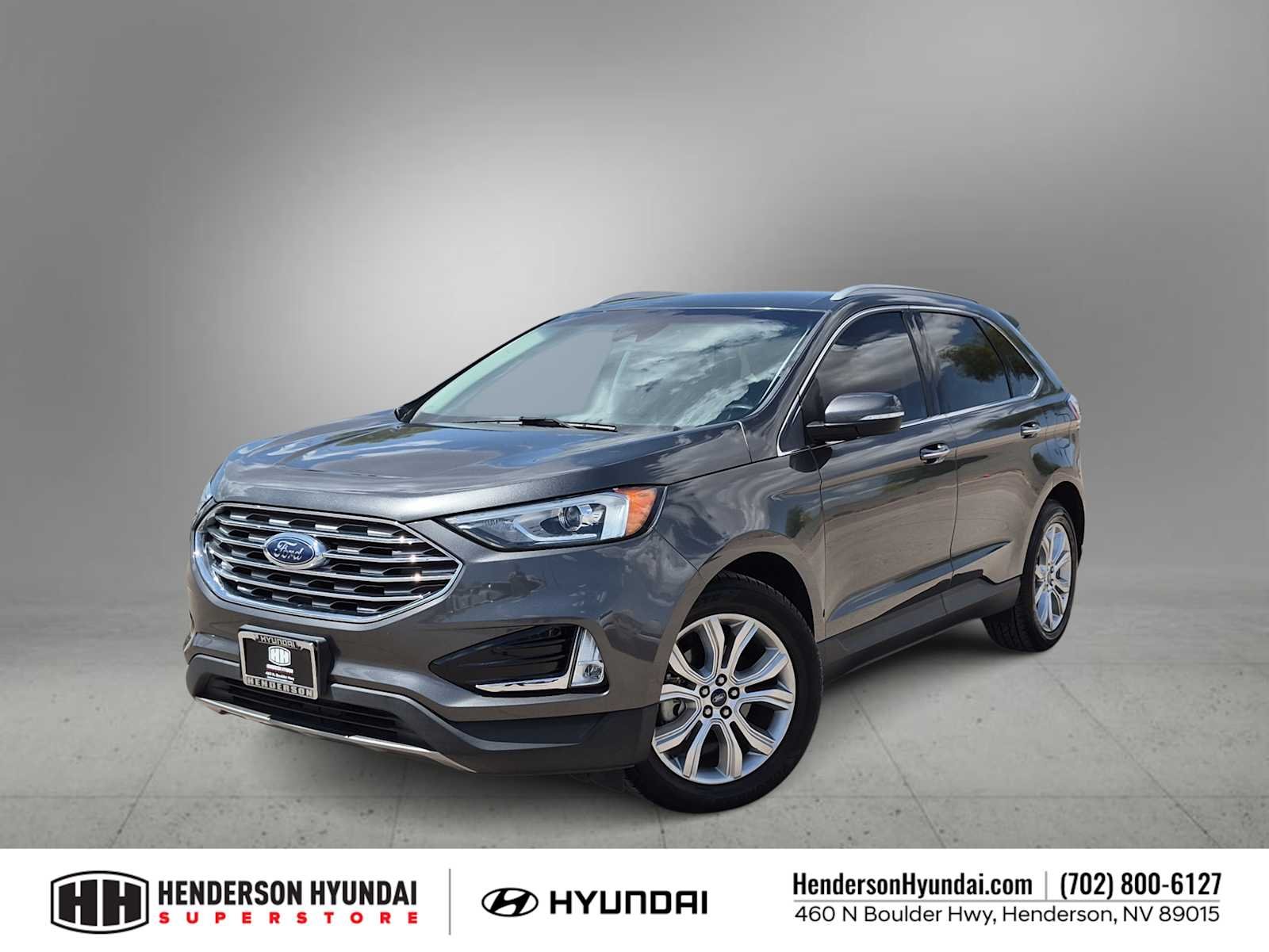 Used 2019 Magnetic Metallic Ford Titanium image 1