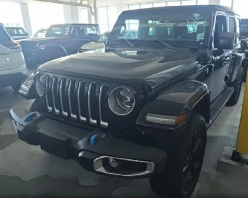 Used 2023 Black Jeep Sahara 4xe image 1