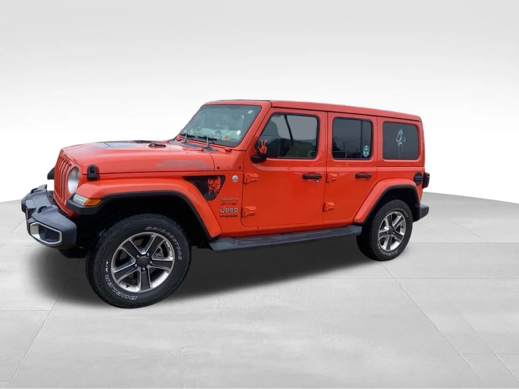 Used 2019 Orange Jeep Unlimited Sahara image 23