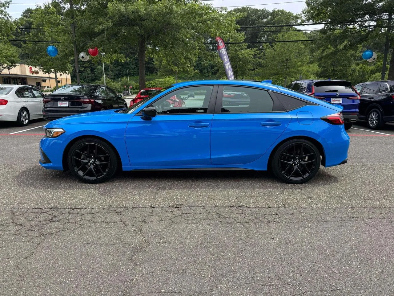 Used 2024 Boost Blue Pearl Honda Sport image 4
