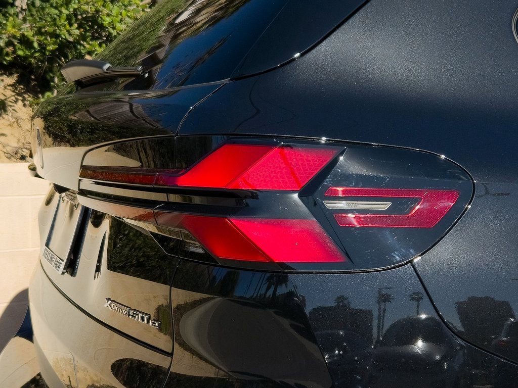 New 2026 Black Sapphire Metallic BMW xDrive50e image 7